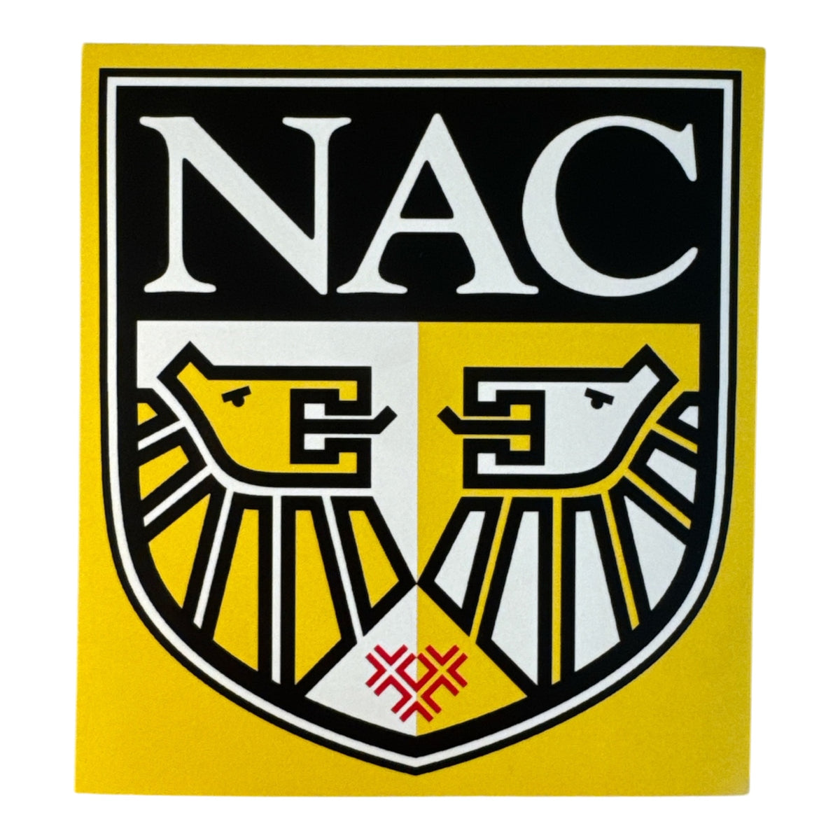 Gele NAC Breda sticker met het oude clublogo uit 1996 tot 2012, schild met twee leeuwen en het Bredase kruis